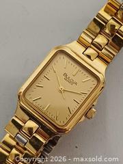 MaxSold Auction: Vintage Boluva Gold Tone Quartz Rectangular Watch Working  - Toronto (Ontario, Canada) PARTNER MANAGED Reseller Online Auction - Queen Street West.