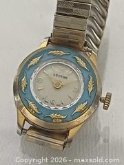 MaxSold Auction: Vintage LECTRO Swiss Wind Up Ladies Watch Working Condition  - Toronto (Ontario, Canada) PARTNER MANAGED Reseller Online Auction - Queen Street West.