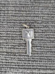 MaxSold Auction: Sterling Silver Playboy Key Charm - Hamilton (Ontario, Canada) SELLER MANAGED Estate Sale Online Auction - Bishopsgate Avenue
