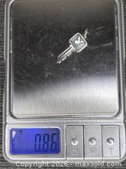 MaxSold Auction: Sterling Silver Playboy Key Charm - Hamilton (Ontario, Canada) SELLER MANAGED Estate Sale Online Auction - Bishopsgate Avenue