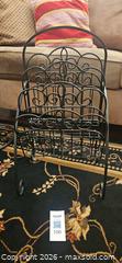 MaxSold Auction: Black Metal Magazine Rack with Decorative Scrollwork - Kingston (Ontario, Canada) PARTNER MANAGED Moving Online Auction - Fernmoor Drive