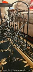 MaxSold Auction: Black Metal Magazine Rack with Decorative Scrollwork - Kingston (Ontario, Canada) PARTNER MANAGED Moving Online Auction - Fernmoor Drive