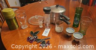 MaxSold Auction: Mixed kitchen glassware lot with stacking saucepan and assorted glasses - Kingston (Ontario, Canada) PARTNER MANAGED Moving Online Auction - Fernmoor Drive
