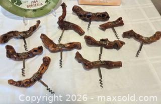 MaxSold Auction: Wine Lot: Ten Vintage French Burlwood Corkscrews, A Chateau St. Julien Wine Plate by Susan Winget, and New Wine Book Double-Signed by the Authors - San Jose (California, USA) SELLER MANAGED Downsizing Online Auction - Elm Street (CONDO)