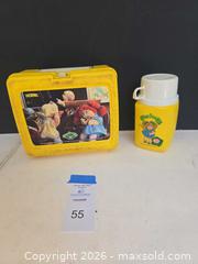 MaxSold Auction: Cabbage Patch Kids Yellow Plastic Lunchbox with Thermos (1980s) - Lakeland (Florida, USA) PARTNER MANAGED Downsizing Online Auction - Shore Acres Drive