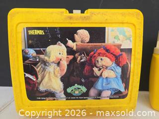 MaxSold Auction: Cabbage Patch Kids Yellow Plastic Lunchbox with Thermos (1980s) - Lakeland (Florida, USA) PARTNER MANAGED Downsizing Online Auction - Shore Acres Drive