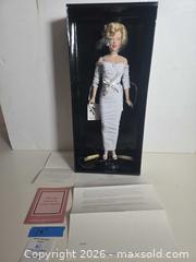 MaxSold Auction: Franklin Heirloom Marilyn Monroe 16" Porcelain Doll - Lakeland (Florida, USA) PARTNER MANAGED Downsizing Online Auction - Shore Acres Drive