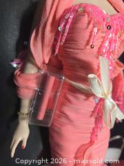 MaxSold Auction: Franklin Mint Marilyn Monroe Collector Doll, 16 in, Coral Outfit - Lakeland (Florida, USA) PARTNER MANAGED Downsizing Online Auction - Shore Acres Drive