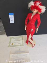 MaxSold Auction: Franklin Mint Marilyn Monroe Porcelain Doll with Dress - Lakeland (Florida, USA) PARTNER MANAGED Downsizing Online Auction - Shore Acres Drive