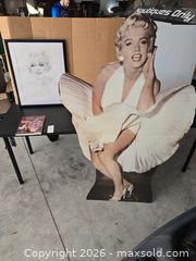 MaxSold Auction: Marilyn Monroe Collectible Standee, Framed Print & Guide Book - Lakeland (Florida, USA) PARTNER MANAGED Downsizing Online Auction - Shore Acres Drive