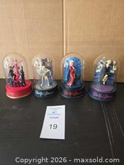 MaxSold Auction: Set of 4 Marilyn Monroe Music Box Figurines In Glass Domes - Lakeland (Florida, USA) PARTNER MANAGED Downsizing Online Auction - Shore Acres Drive