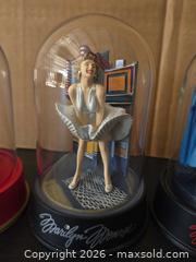 MaxSold Auction: Set of 4 Marilyn Monroe Music Box Figurines In Glass Domes - Lakeland (Florida, USA) PARTNER MANAGED Downsizing Online Auction - Shore Acres Drive