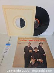 MaxSold Auction: The Beatles — Introducing... The Beatles (Vee-Jay 12" LP) - Lakeland (Florida, USA) PARTNER MANAGED Downsizing Online Auction - Shore Acres Drive