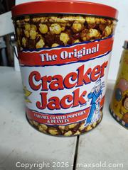 MaxSold Auction: Vintage Cracker Jack and Peanuts Chex Canisters - Walworth (New York, USA) SELLER MANAGED Downsizing Online Auction -  High Street