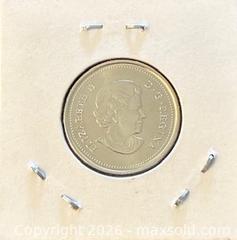 MaxSold Auction: 1965-2015 Cdn. Colour 50th Anniversary of the Canadian National Flag 25 Cents  - Newmarket (Ontario, Canada) PARTNER MANAGED Reseller Online Auction - Walter Avenue