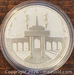 MaxSold Auction: 1984S US Silver Proof LA Olympiad Coliseum Commemorative Olympic Games 1 Dollar  - Newmarket (Ontario, Canada) PARTNER MANAGED Reseller Online Auction - Walter Avenue