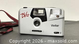 MaxSold Auction: 2 Assort Camera 35mm Film Cameras (as is)  - Newmarket (Ontario, Canada) PARTNER MANAGED Reseller Online Auction - Walter Avenue