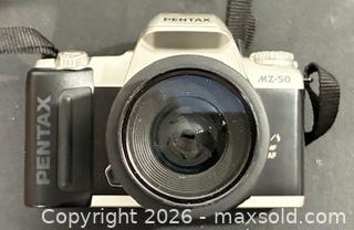 MaxSold Auction: Pentax MZ-50 SLR 35mm Film Camera 35-80mm Lens (as is)  - Newmarket (Ontario, Canada) PARTNER MANAGED Reseller Online Auction - Walter Avenue