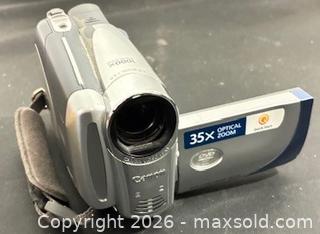MaxSold Auction: Retro Canon DC210 DVD Camcorder (as is)  - Newmarket (Ontario, Canada) PARTNER MANAGED Reseller Online Auction - Walter Avenue