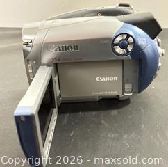 MaxSold Auction: Retro Canon DC210 DVD Camcorder (as is)  - Newmarket (Ontario, Canada) PARTNER MANAGED Reseller Online Auction - Walter Avenue