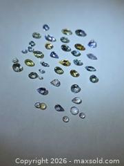 MaxSold Auction: Natural rare untreated Exotic Tanzanite lot - Toronto (Ontario, Canada) PARTNER MANAGED Reseller Online Auction - Gerrard Street West