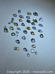 MaxSold Auction: Natural rare untreated Exotic Tanzanite lot - Toronto (Ontario, Canada) PARTNER MANAGED Reseller Online Auction - Gerrard Street West