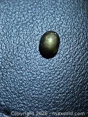 MaxSold Auction: Natural untreated green/black star sapphire. - Toronto (Ontario, Canada) PARTNER MANAGED Reseller Online Auction - Gerrard Street West