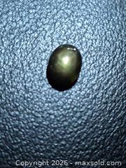 MaxSold Auction: Natural untreated green/black star sapphire. - Toronto (Ontario, Canada) PARTNER MANAGED Reseller Online Auction - Gerrard Street West