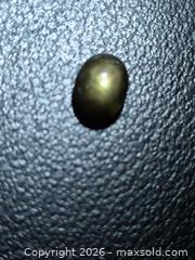 MaxSold Auction: Natural untreated green/black star sapphire. - Toronto (Ontario, Canada) PARTNER MANAGED Reseller Online Auction - Gerrard Street West