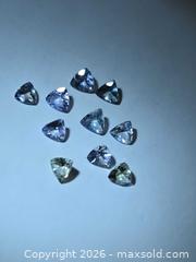MaxSold Auction: Rare untreated Tanzanite lot  - Toronto (Ontario, Canada) PARTNER MANAGED Reseller Online Auction - Gerrard Street West