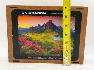 MaxSold Auction: Unidragon Wooden Jigsaw Puzzle featuring a mountain landscape - Menlo Park (California, USA) SELLER MANAGED Downsizing Online Auction - Henderson Place
