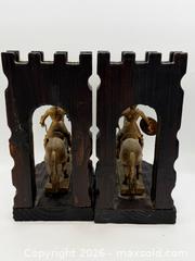 MaxSold Auction: Vintage mid-century Italian bookends featuring knights on horseback leaving a castle gate - Menlo Park (California, USA) SELLER MANAGED Downsizing Online Auction - Henderson Place