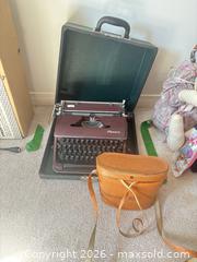MaxSold Auction: Typewriter and Binoculars. A - Kingston (Ontario, Canada) Moving Online Auction - Sheridan Street