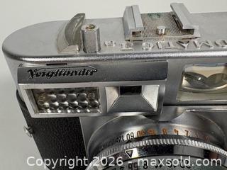 MaxSold Auction: VOIGTLÄNDER Vitomatic ll 35mm Film Camera with Leather Case and Original Manual - Toronto (Ontario, Canada) SELLER MANAGED Reseller Online Auction - Chesswood Drive