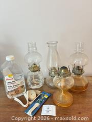 MaxSold Auction: Assortment of OIL LAMPS  - Meaford (Ontario, Canada) PARTNER MANAGED Estate Sale Online Auction - Graham Street