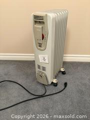 MaxSold Auction: DeLONGHI ROLLING HEATER 2507 Series - Meaford (Ontario, Canada) PARTNER MANAGED Estate Sale Online Auction - Graham Street