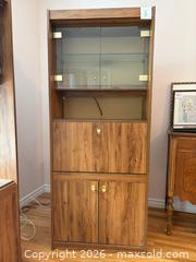 MaxSold Auction: Mid-Century Wood Veneer Tall Cabinet - Meaford (Ontario, Canada) PARTNER MANAGED Estate Sale Online Auction - Graham Street