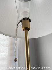 MaxSold Auction: IKEA ÅRSTID floor lamp in brass with a white pleated shade - Ottawa (Ontario, Canada) PARTNER MANAGED Downsizing Online Auction - Gladwin Crescent