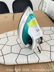 MaxSold Auction: Iron and small ironing board  - Ottawa (Ontario, Canada) PARTNER MANAGED Downsizing Online Auction - Gladwin Crescent