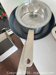 MaxSold Auction: Pots and pan - Ottawa (Ontario, Canada) PARTNER MANAGED Downsizing Online Auction - Gladwin Crescent