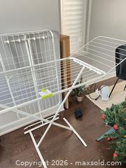 MaxSold Auction: Two clothing racks - Ottawa (Ontario, Canada) PARTNER MANAGED Downsizing Online Auction - Gladwin Crescent