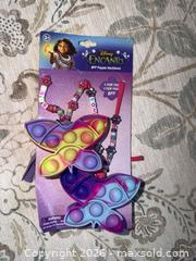 MaxSold Auction: New in package DISNEY ENCANTO BFF POPPER NECKLACE  - Warwick Township (Pennsylvania, USA) SELLER MANAGED Estate Sale Online Auction - Crocker Lane