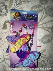 MaxSold Auction: New in package DISNEY ENCANTO BFF POPPER NECKLACE  - Warwick Township (Pennsylvania, USA) SELLER MANAGED Estate Sale Online Auction - Crocker Lane