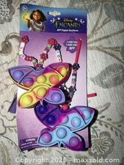 MaxSold Auction: New in package DISNEY ENCANTO BFF POPPER NECKLACE  - Warwick Township (Pennsylvania, USA) SELLER MANAGED Estate Sale Online Auction - Crocker Lane
