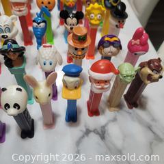 MaxSold Auction: Large Vintage PEZ Dispenser Lot – Disney, Garfield, Simpsons, Hello Kitty & More - Tillsonburg (Ontario, Canada) SELLER MANAGED Reseller Online Auction - Wilson Avenue