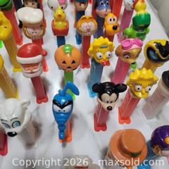 MaxSold Auction: Large Vintage PEZ Dispenser Lot – Disney, Garfield, Simpsons, Hello Kitty & More - Tillsonburg (Ontario, Canada) SELLER MANAGED Reseller Online Auction - Wilson Avenue