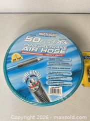 MaxSold Auction: 50 ft 1/4 in Polyurethane Air Hose with Quick Coupler Set - San Jose (California, USA) SELLER MANAGED Downsizing Online Auction - East Humboldt Street