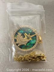 MaxSold Auction: Gold Unicorn Necklace with Cubic Zirconia Accent, 18 in - San Jose (California, USA) SELLER MANAGED Downsizing Online Auction - East Humboldt Street