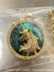 MaxSold Auction: Gold Unicorn Necklace with Cubic Zirconia Accent, 18 in - San Jose (California, USA) SELLER MANAGED Downsizing Online Auction - East Humboldt Street