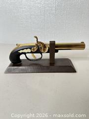 MaxSold Auction: Lighter Brass Flintlock Decorative Replica  - San Jose (California, USA) SELLER MANAGED Downsizing Online Auction - East Humboldt Street